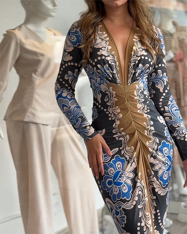 Vestido estampado plisado con cuello en V y manga larga