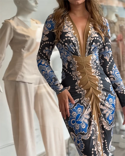 Vestido estampado plisado con cuello en V y manga larga